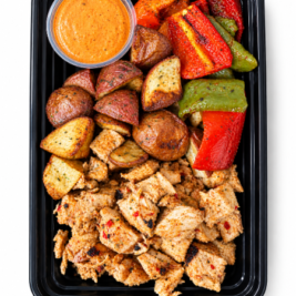 Hot Honey Chicken with Roasted Red Potatoes & Bell Peppers, Greek Yogurt Chipotle Sauce Plate Hot honey, chicken, roasted red potatoes and bell peppers with Greek yogurt, chipotle dipping sauce